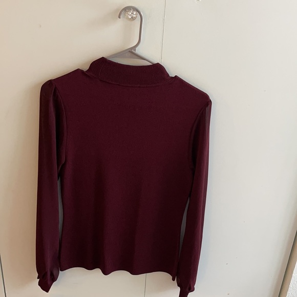 INC top with cut outs and sheer sleeves. - Picture 2 of 3